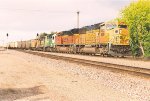 Coal empties ease west towards the yard and a crew change